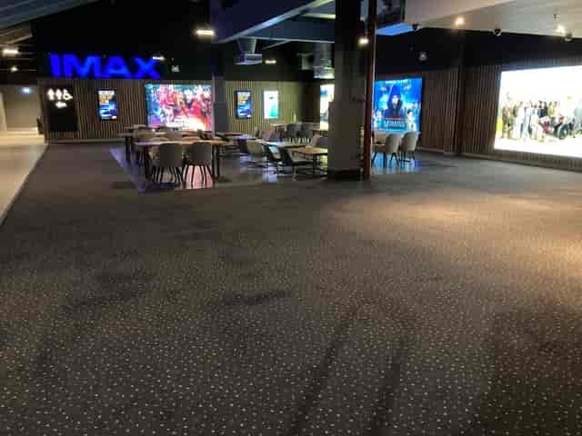 "Vue Manchester cinema screens with modern seating for corporate events and screenings."
