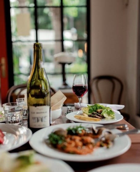 Il Becco restaurant: High-end networking dinner setting with fine dining and wine pairing.