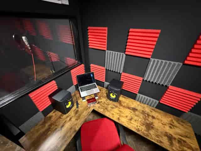 Sound-treated breakout studio for hybrid event broadcasting and professional podcasting.