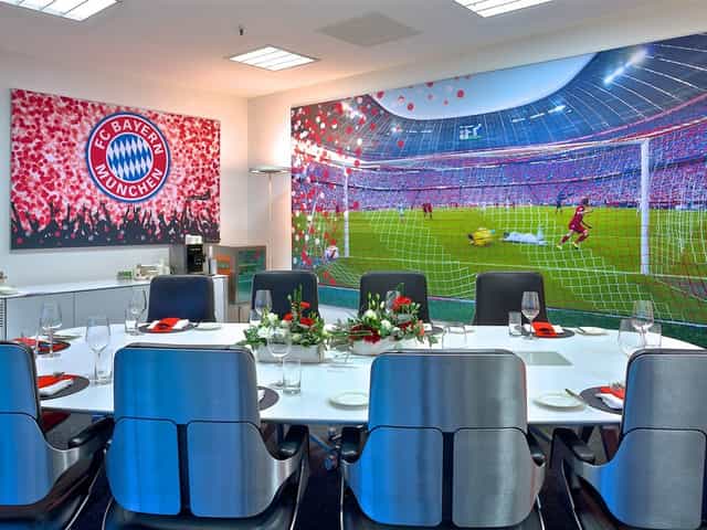 Presenterbox 6 boardroom at Allianz Arena: branded corporate hospitality and meeting space.