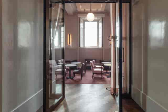 Supporters' House Salon, modern meeting space for workshops and gatherings.