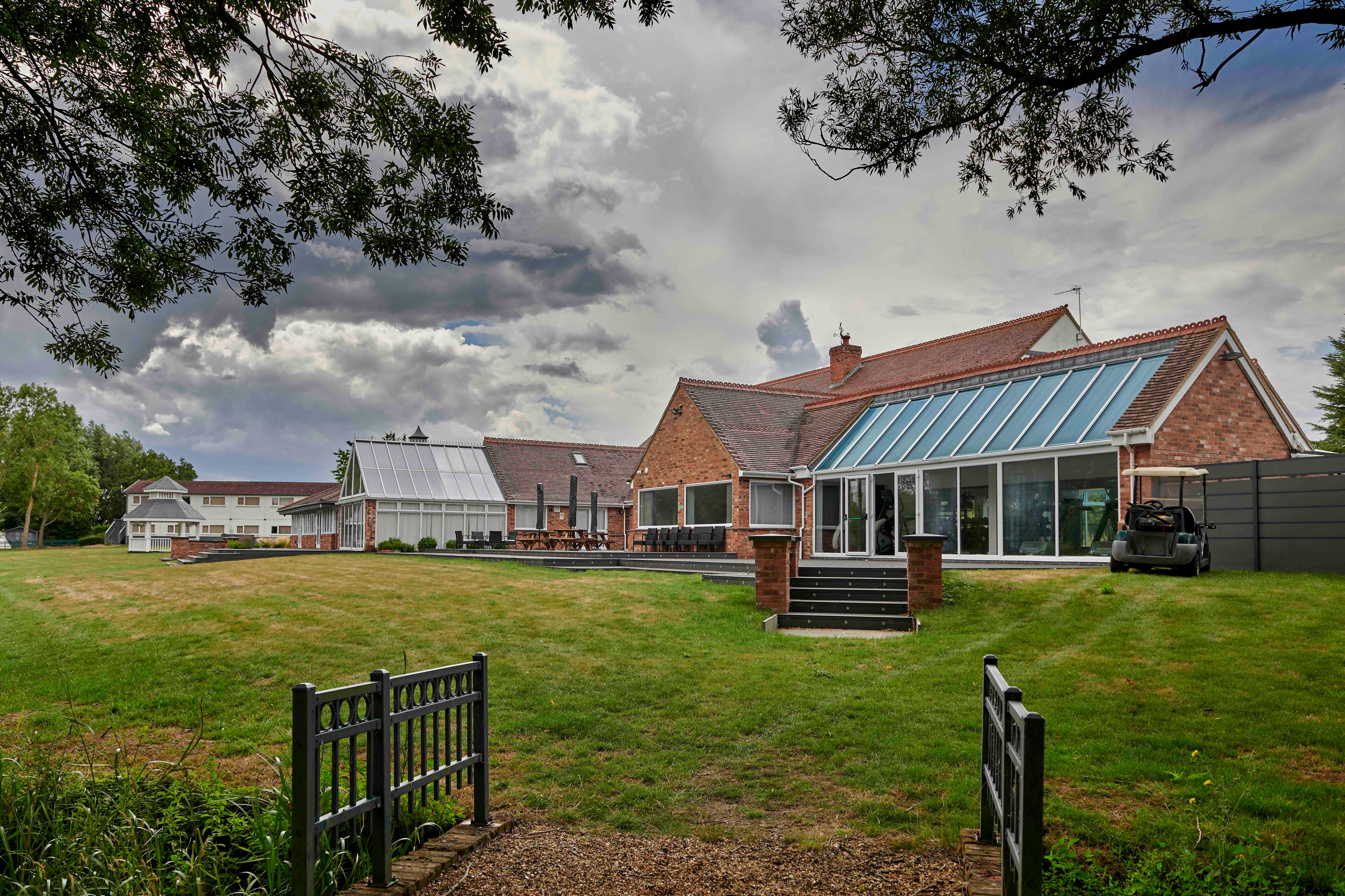 Spacious Events Hall in Kingfisher Park with glass windows for corporate meetings and social events.