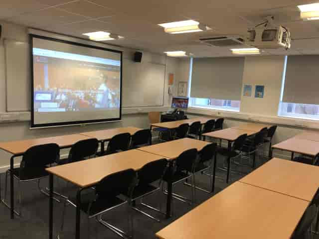 Classroom-style meeting room at London Business School for professional training and workshops.