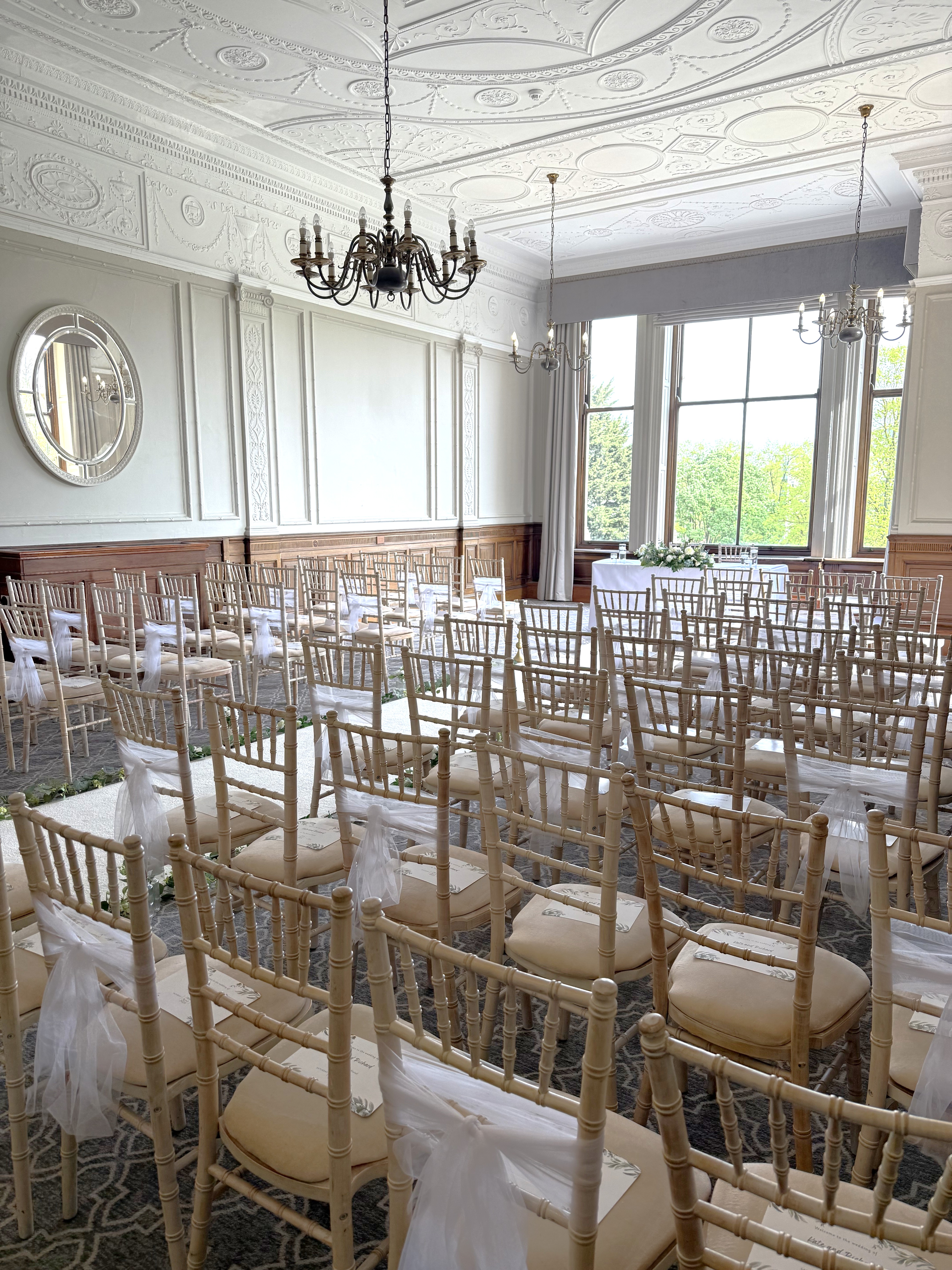 Elegant Wedgewood event space with chiavari chairs, ideal for weddings and gatherings.