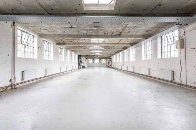 Spacious Electrowerkz penthouse with high ceilings, ideal for corporate events and workshops.
