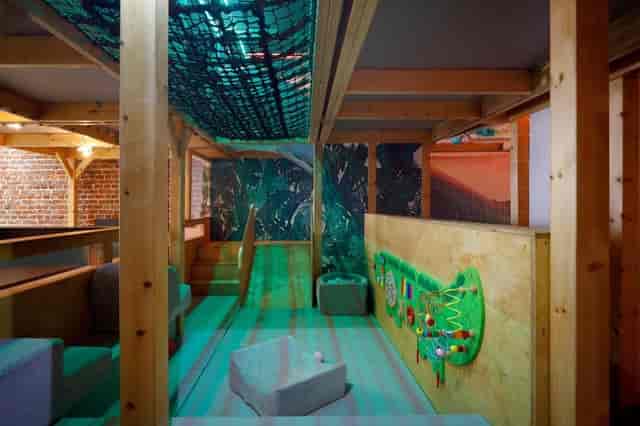 Immersive WRAP kitchen breakout zone for interactive team-building and design-thinking sessions.