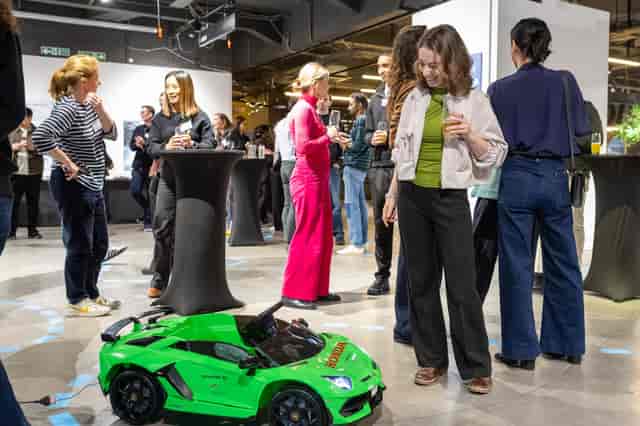 Main Gallery networking event with brand activation and cocktail tables for corporate hire.