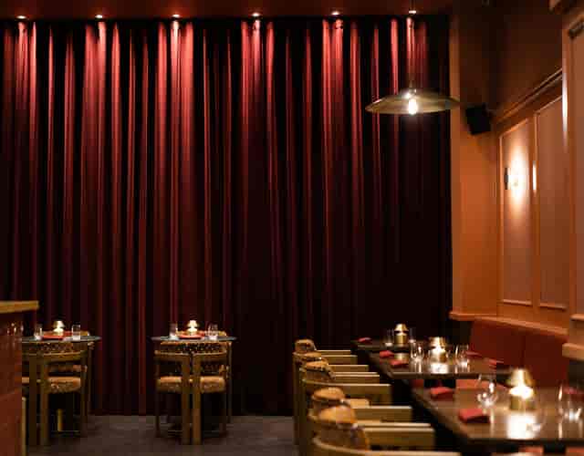 Shakara main room with elegant floor-to-ceiling drapery for VIP dinners and exclusive receptions.