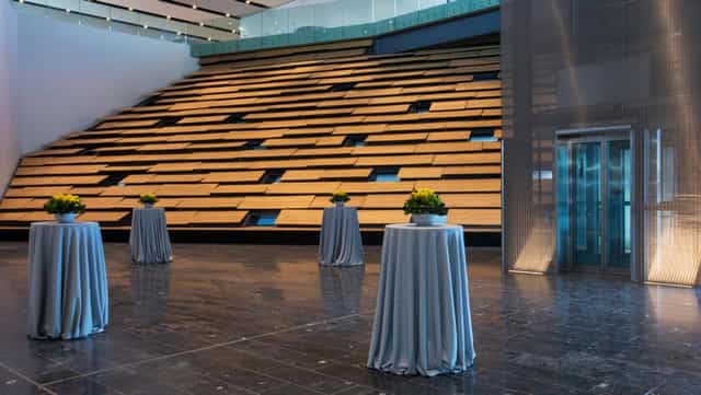 Juniper Auditorium at V&A Dundee: Modern networking reception space for corporate events.