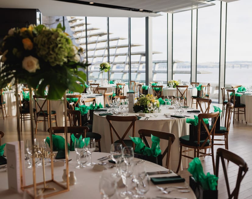 Tatha Bar & Kitchen ballroom with floor-to-ceiling windows for corporate galas and luxury weddings.