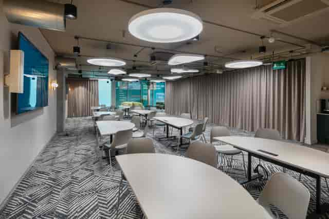 Modern meeting space at The Atrium with cabaret seating for workshops and collaborative sessions.