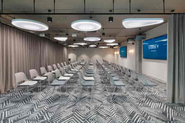 Theater-style breakout room at The Atrium with AV displays for corporate training and presentations.