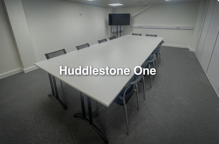 Spacious meeting room "Huddlestone One" in Sentinel House for professional gatherings.