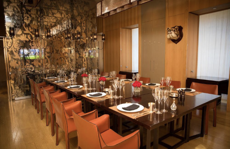 Private dining room with elegant setup for upscale events at Rosewood London.