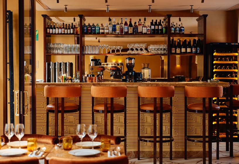 Upscale Theatre in Colère with bar seating for VIP networking receptions and corporate events.