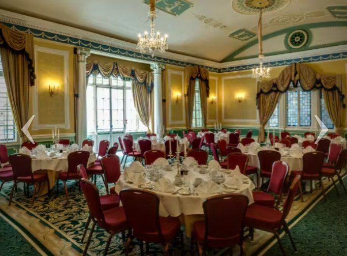 The Old Ship Hotel ballroom, featuring elegant chandeliers, for corporate banquets and gala dinners. - Banner