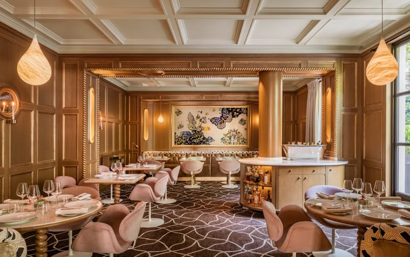 Anne & Lounge at Hôtel Le Pavillon de la Reine: wood-paneled upscale venue for VIP events.