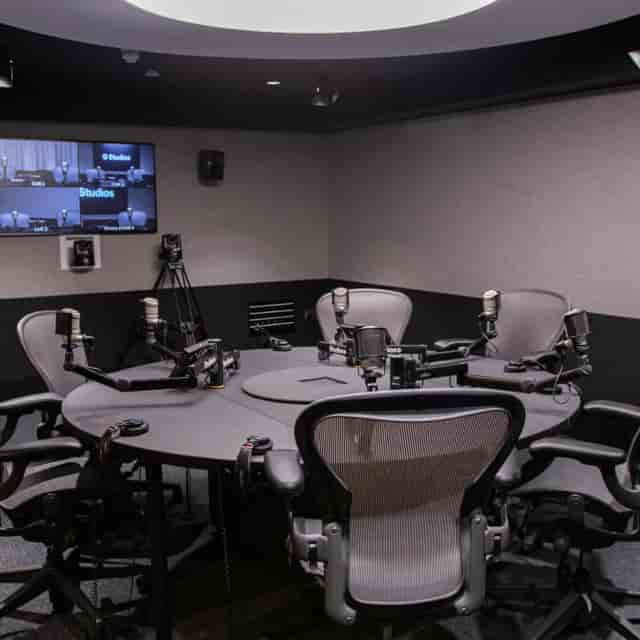 Professional podcast booth for hybrid recording and multi-person broadcast studio production.