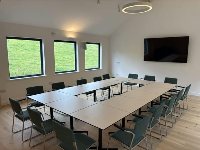 U-shape meeting room with kitchen at Crosscrake Community Hub for workshops and events.