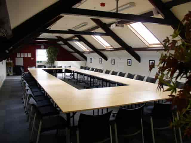 U-shape attic meeting room at Motor Hub Warwick for collaborative workshops and board meetings.
