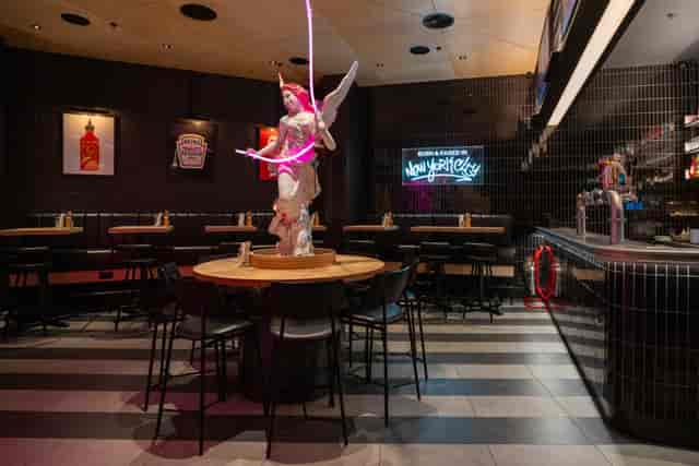 BoomBox Bar at Black Tap: High-top seating for edgy networking receptions and cocktail events.