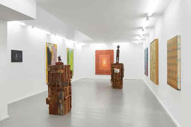 Modern studio reception space with built-in lighting for intimate networking and gallery events.