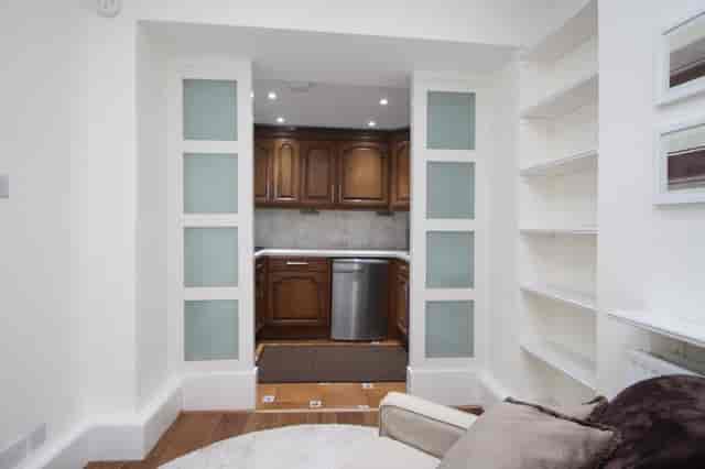 Lower ground floor studio at 37 Eastcastle Street featuring a discreet catering area for events.