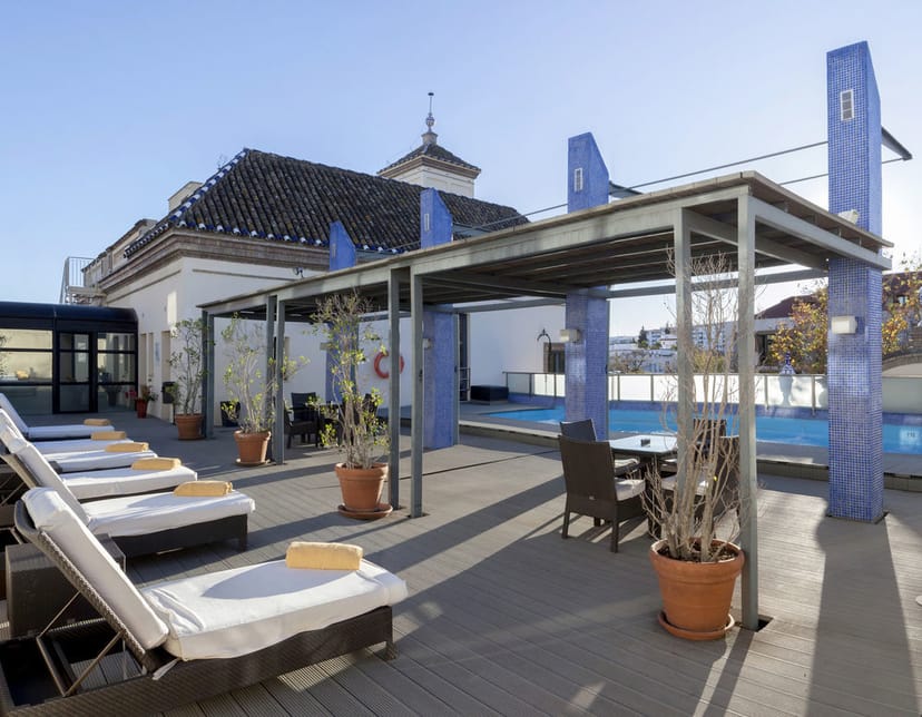 Canónigos rooftop breakout space at AC Hotel Sevilla for corporate networking and incentive events.