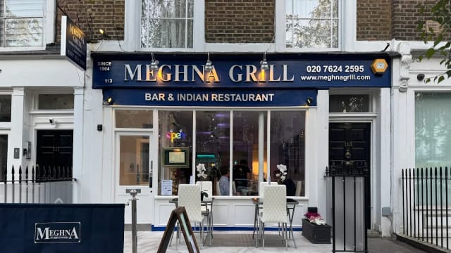 Meghna Grill bar with outdoor seating, ideal for intimate dinners and corporate events.