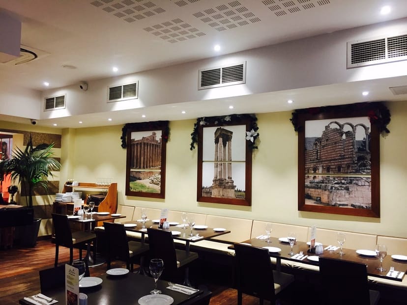 Meghna Grill bar with banquette seating for casual business lunches and corporate event hosting.