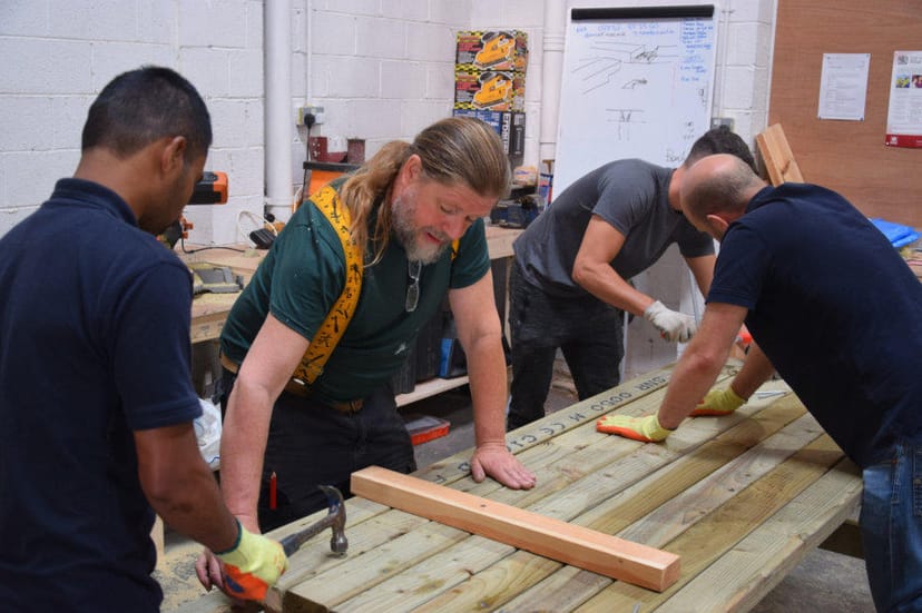 Hands-on CSR team-building workshop in Boiler House for corporate event planning.