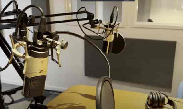 Podcast studio with professional microphones for high-quality virtual events and recordings.