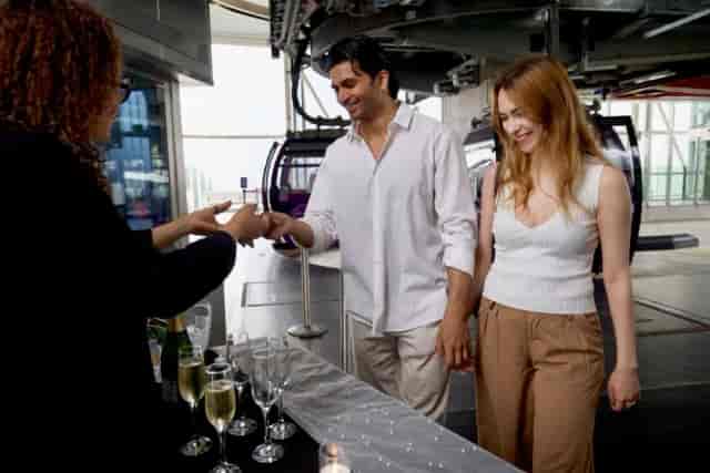 Cable car cabin event setup in London with champagne, perfect for upscale celebrations.