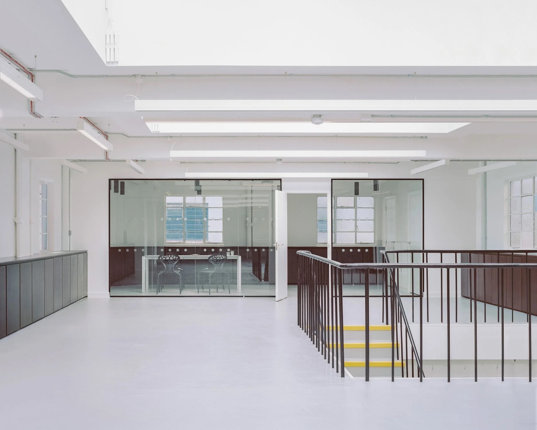 Minimalist breakout area at Black Seed, ideal for corporate workshops and team meetings. - Banner