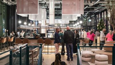 The Colonnade in Canary Wharf: modern event space with lively bar for networking and gatherings.