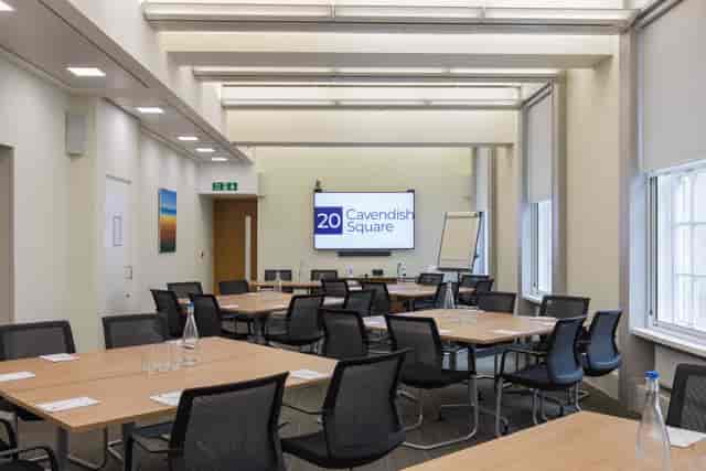 Peggy Nuttall in a versatile meeting room, perfect for professional events and workshops.