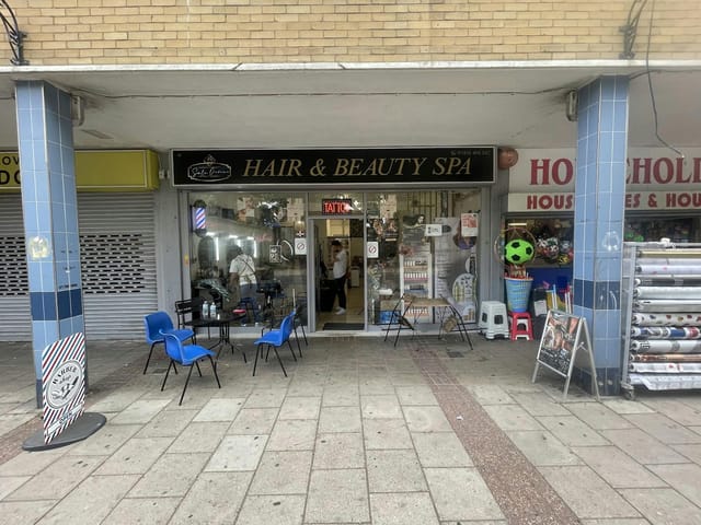 Suli Divine outdoor salon breakout area lacking ADA compliance and professional branding.
