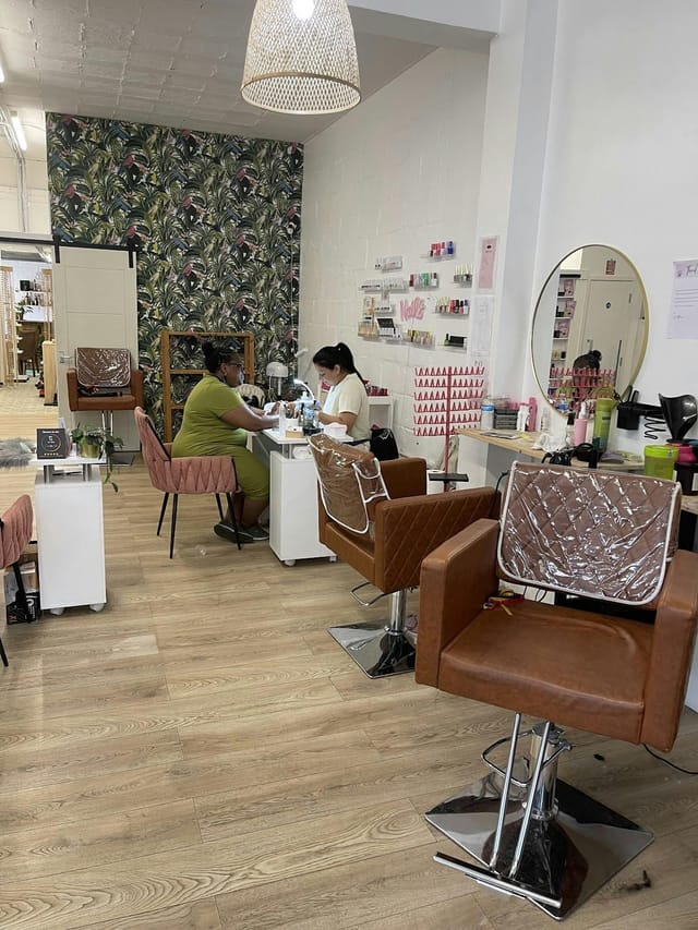 Suli Divine salon boutique with intimate high-contrast interior for personalized beauty services.