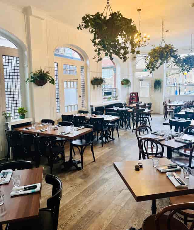 Bright dining space at The Jolly Gardeners, ideal for private events and networking breakfasts.