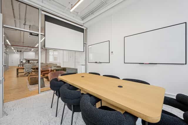 Modern Mercer Meeting Room 402 A with large conference table for collaborative events.