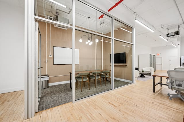 Mercer Meeting Room 402 B with glass walls, ideal for professional events and presentations.