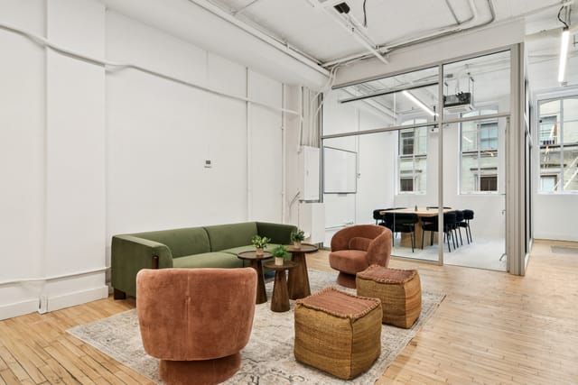 Modern meeting space with glass breakout room for collaborative events at The Farm Soho.