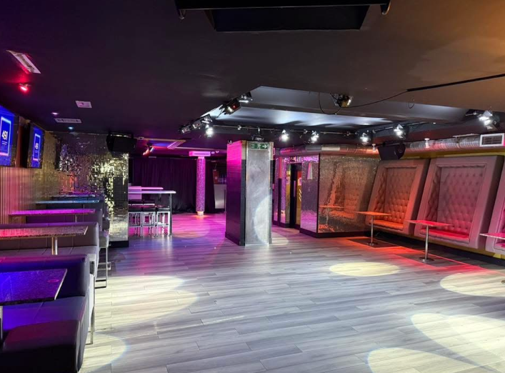 Modern nightlife venue at 491 Union Street with booth seating for networking receptions.