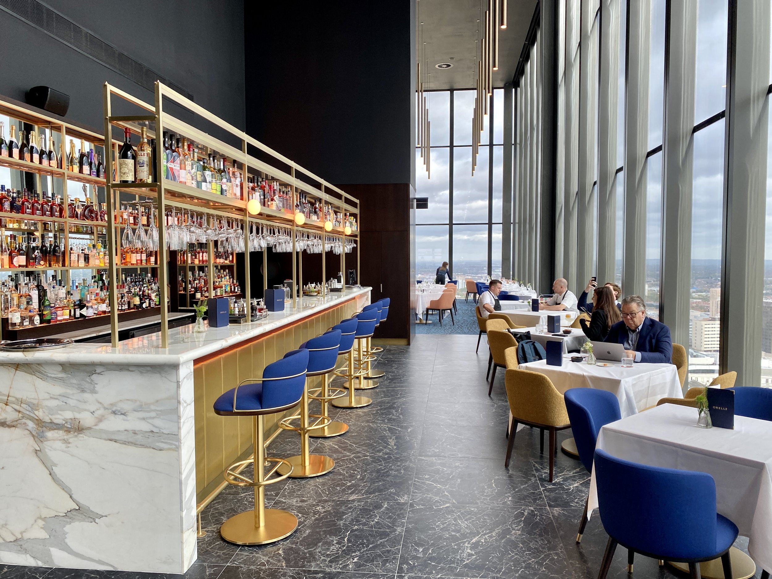 Oriri Lounge: Sophisticated VIP bar with panoramic views for corporate networking events. - Banner