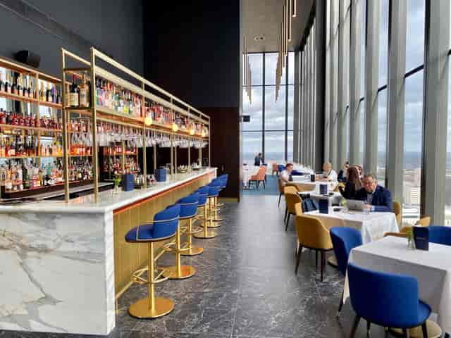 Oriri Lounge: Sophisticated VIP bar with panoramic views for corporate networking events.