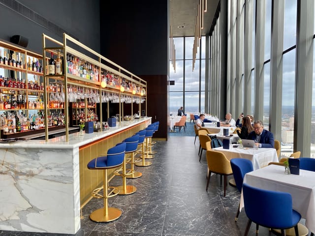 Oriri Lounge: Sophisticated VIP bar with panoramic views for corporate networking events.