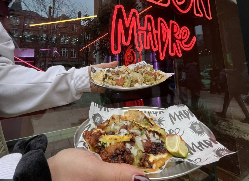 Vibrant catering venue at Salon Madre with stylish dishes for memorable events. - Banner