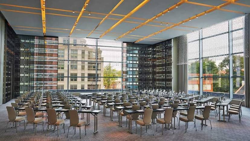 Vinci conference room at Four Seasons Toronto with floor-to-ceiling windows for corporate summits.