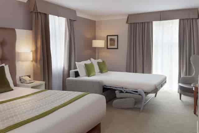 Triple-occupancy guest room at Albrighton Hall and Spa for conference events and room blocks.