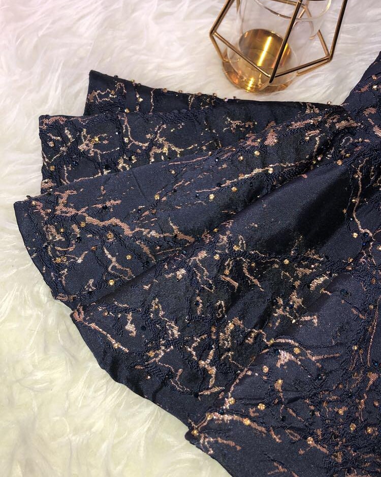 Luxurious fabric with intricate designs for upscale events and fashion decor. - Banner